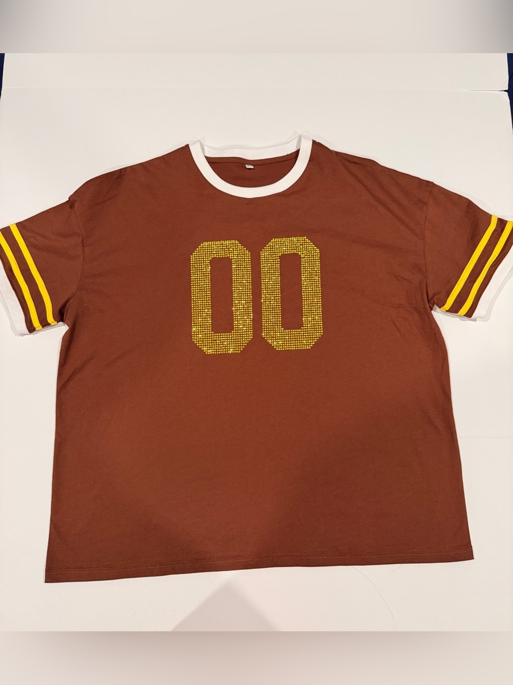 Brown Athletic Shorts with Yellow Stripe Detail